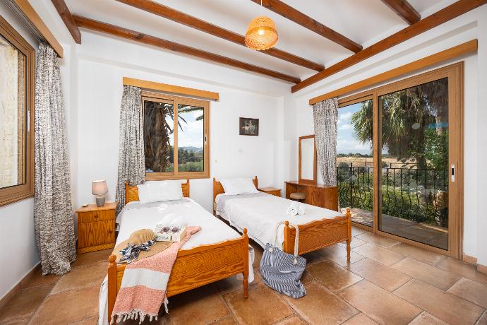 Twin bedroom with en suite bathroom and A/C . - Villa Angela Paradise . (Photo Gallery) }}