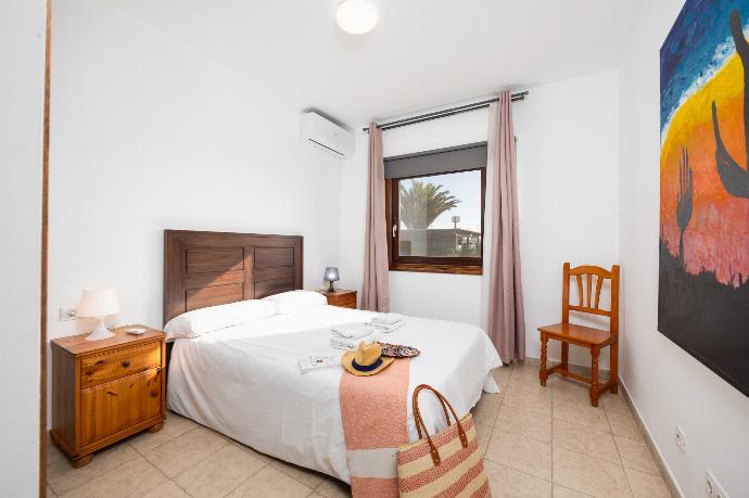 Double bedroom with A/C . - Villa Calma 1B . (Photo Gallery) }}