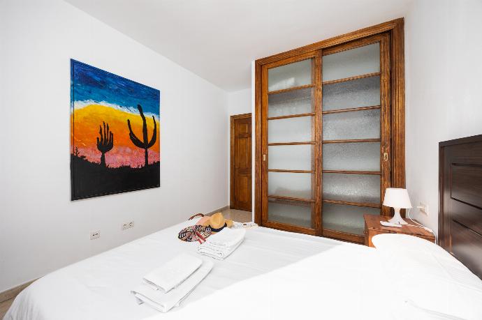 Double bedroom with A/C . - Villa Calma 1B . (Photo Gallery) }}