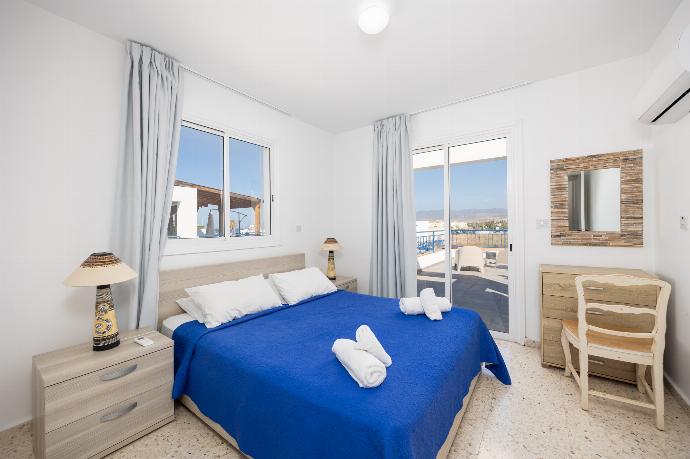 Double bedroom with A/C . - Bluesea View Latchi Apartment . (Photo Gallery) }}