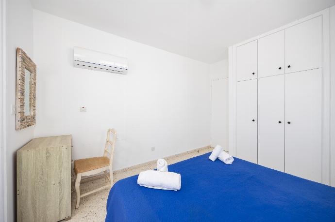 Double bedroom with A/C . - Bluesea View Latchi Apartment . (Photo Gallery) }}