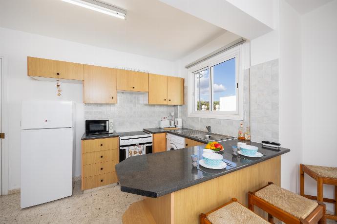 Equipped kitchen . - Latchi Pool Side View Apartment  . (Photo Gallery) }}