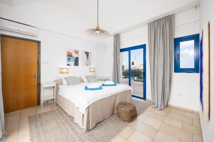 Double bedroom with en suite bathroom and A/C . - Villa Poseidonas . (Photo Gallery) }}