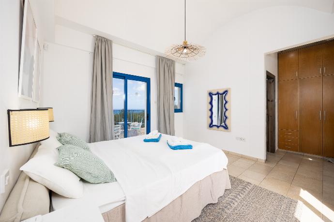 Double bedroom with en suite bathroom and A/C . - Villa Poseidonas . (Photo Gallery) }}