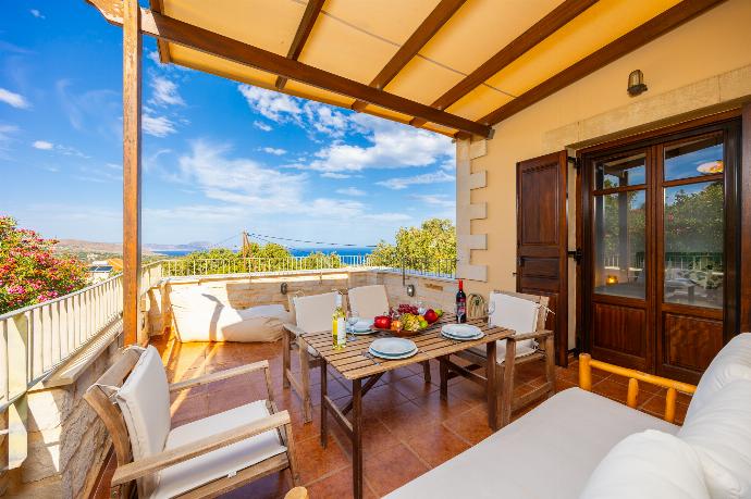 Upper terrace area with sea views . - Villa Lotus . (Photo Gallery) }}