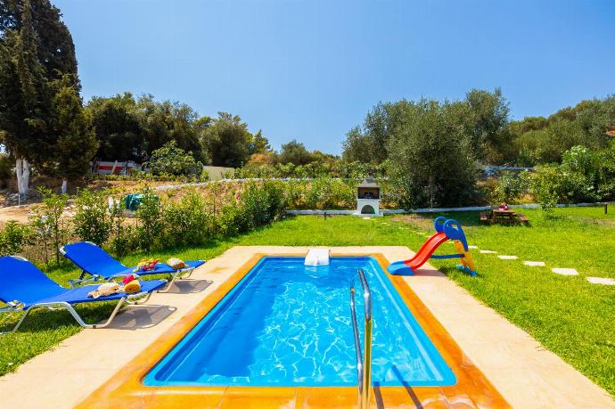 Private pool, terrace, and garden . - Villa Eleftheria . (Photo Gallery) }}