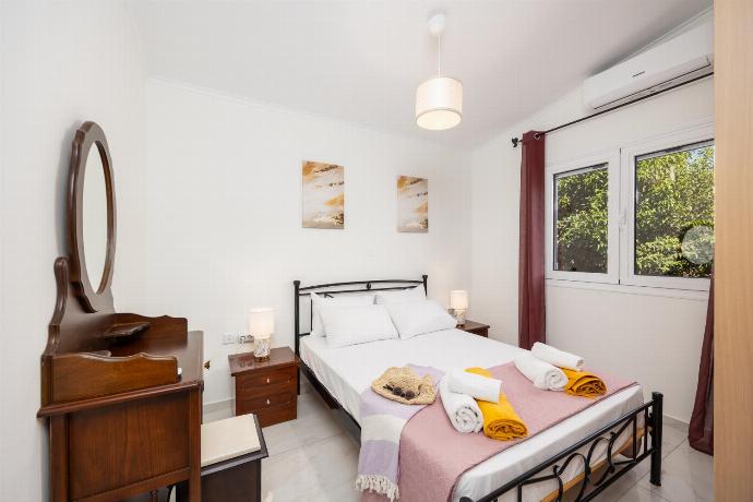 Double bedroom with A/C . - Villa Aggiolina . (Photo Gallery) }}