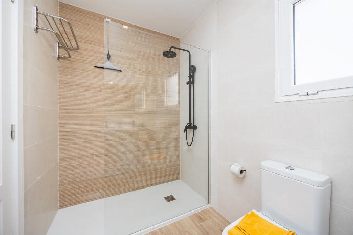 En suite bathroom with shower . - Villa Jordi . (Photo Gallery) }}