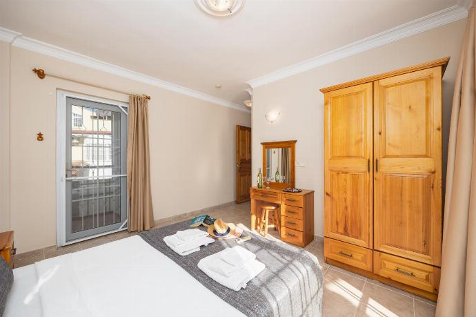 Double bedroom with en suite bathroom and A/C . - Villa Begonvil . (Photo Gallery) }}