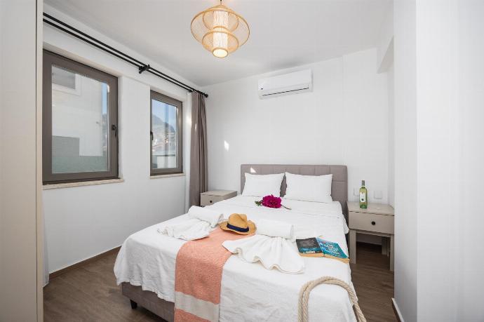 Double bedroom with A/C . - Villa Karya . (Photo Gallery) }}