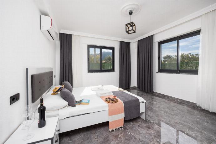 Double bedroom with A/C . - Villa Grand Yasar 1 . (Photo Gallery) }}