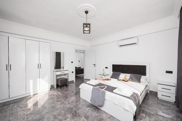 Double bedroom with A/C . - Villa Grand Yasar 2 . (Photo Gallery) }}