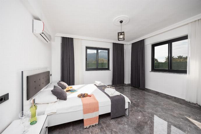 Double bedroom with A/C . - Villa Grand Yasar 2 . (Photo Gallery) }}