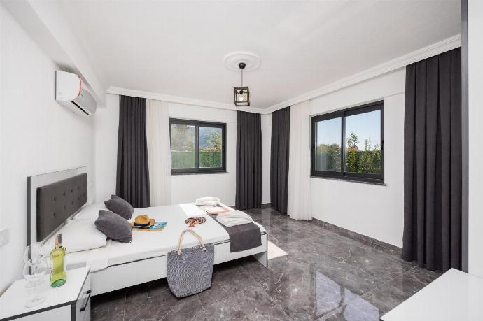 Double bedroom with A/C . - Villa Grand Yasar 3 . (Photo Gallery) }}