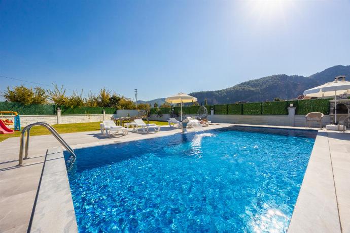 Private pool, terrace, and garden . - Villa Grand Yasar 4 . (Photo Gallery) }}