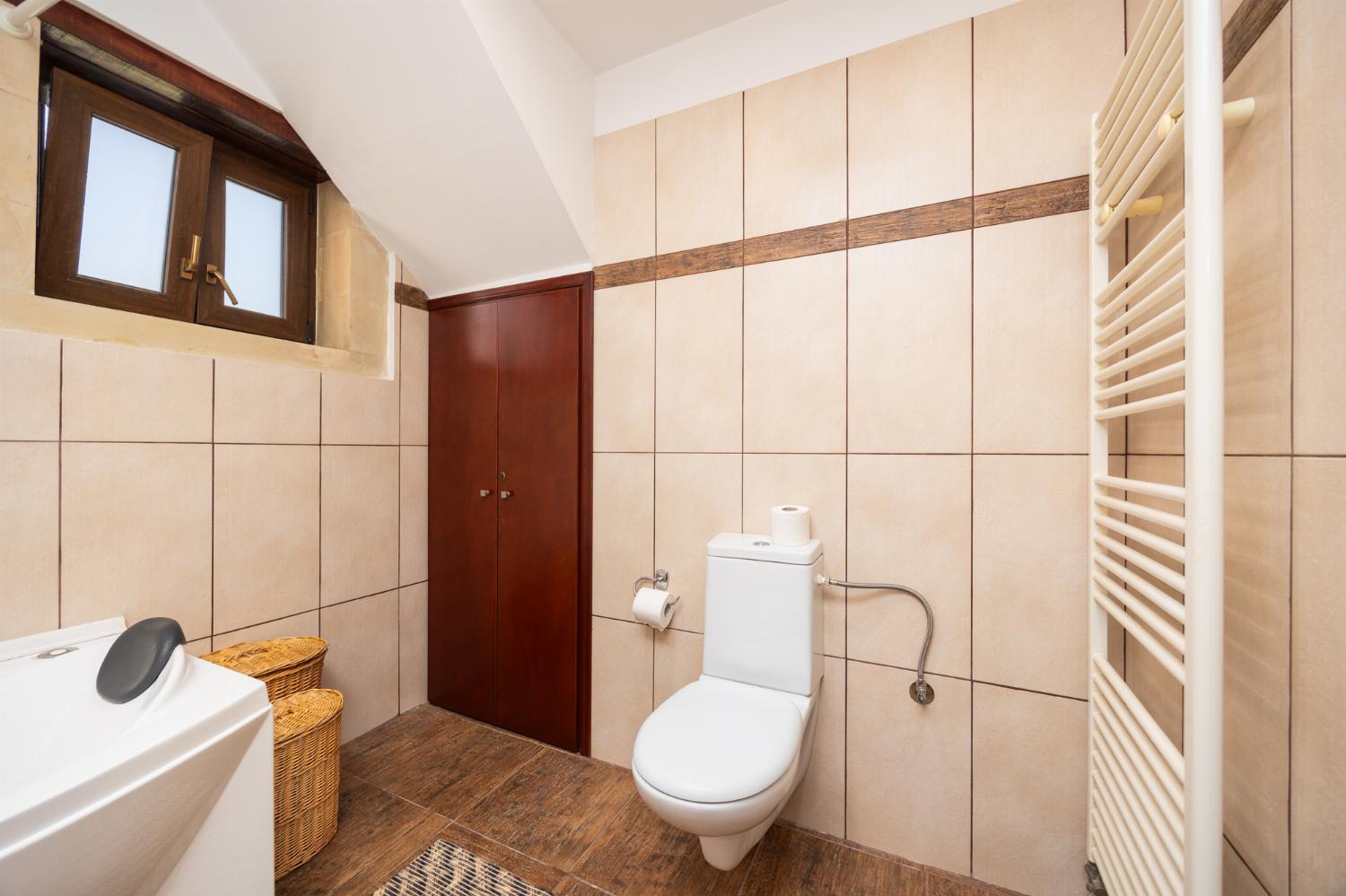 Family bathroom with bath and shower