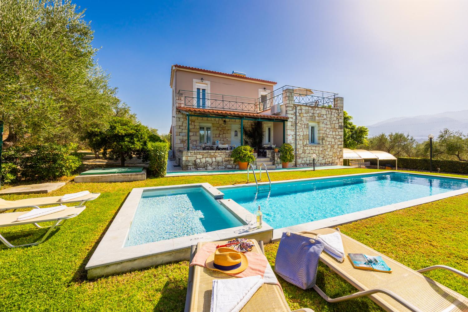 ,Beautiful villa with private pool, terraces, and garden