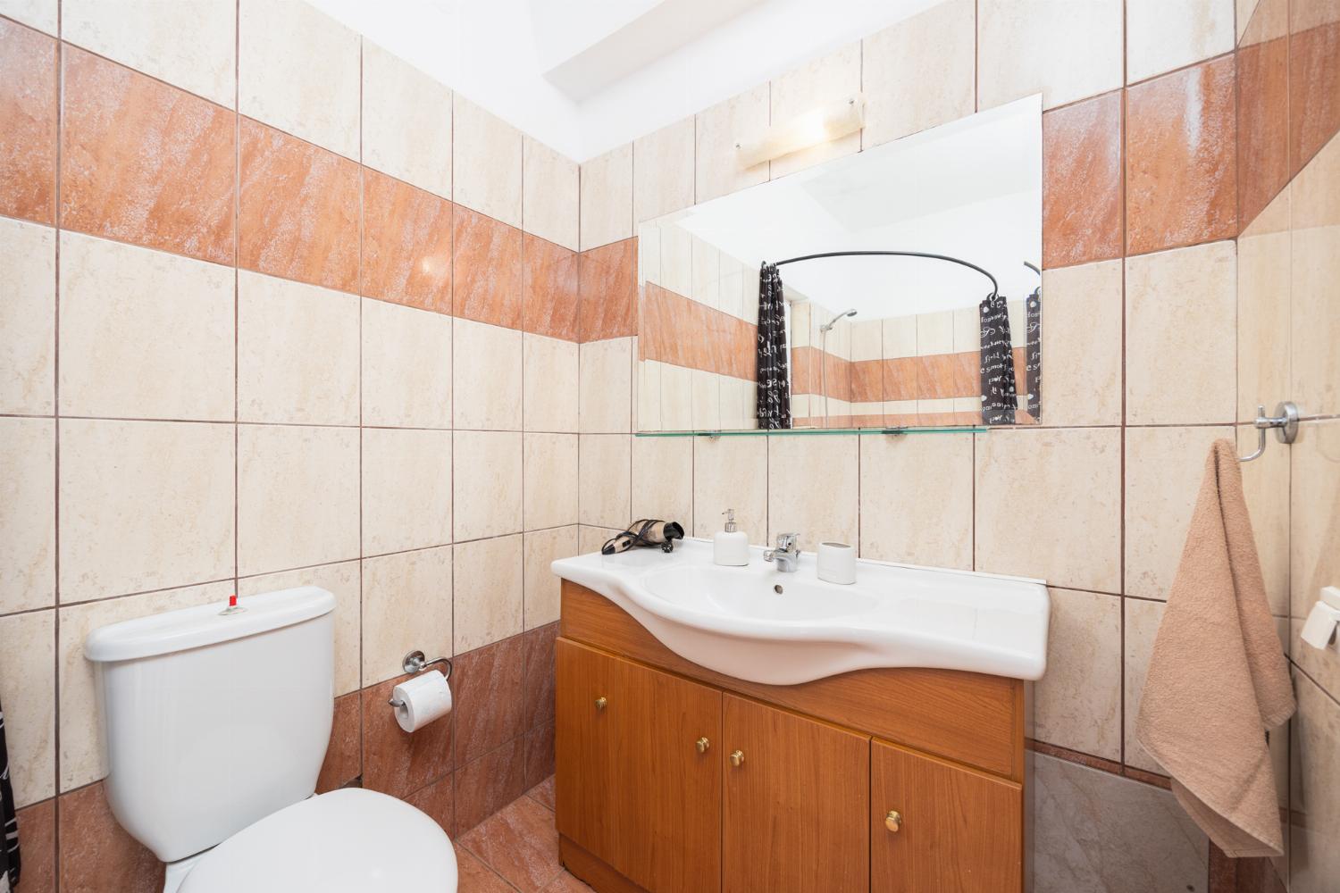 Family bathroom with bath and shower