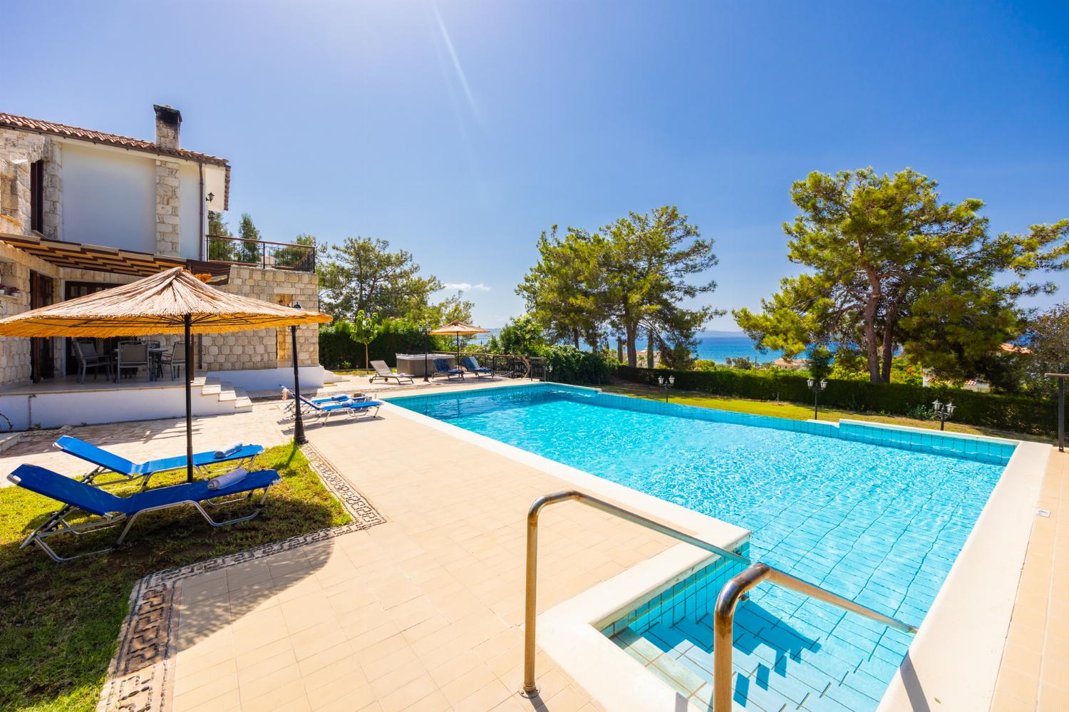 Private pool, terrace, and garden with sea views