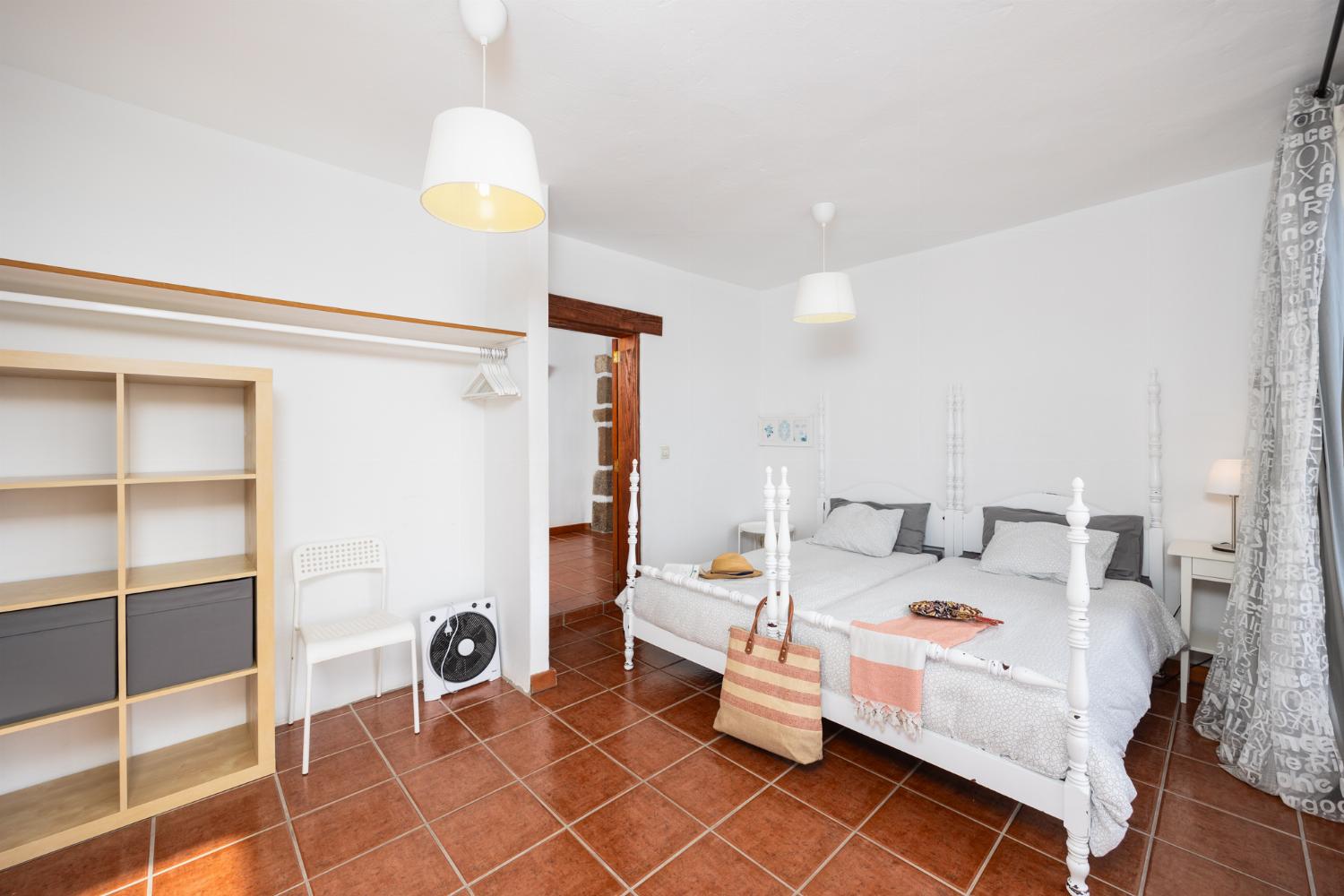 Twin bedroom with sea views