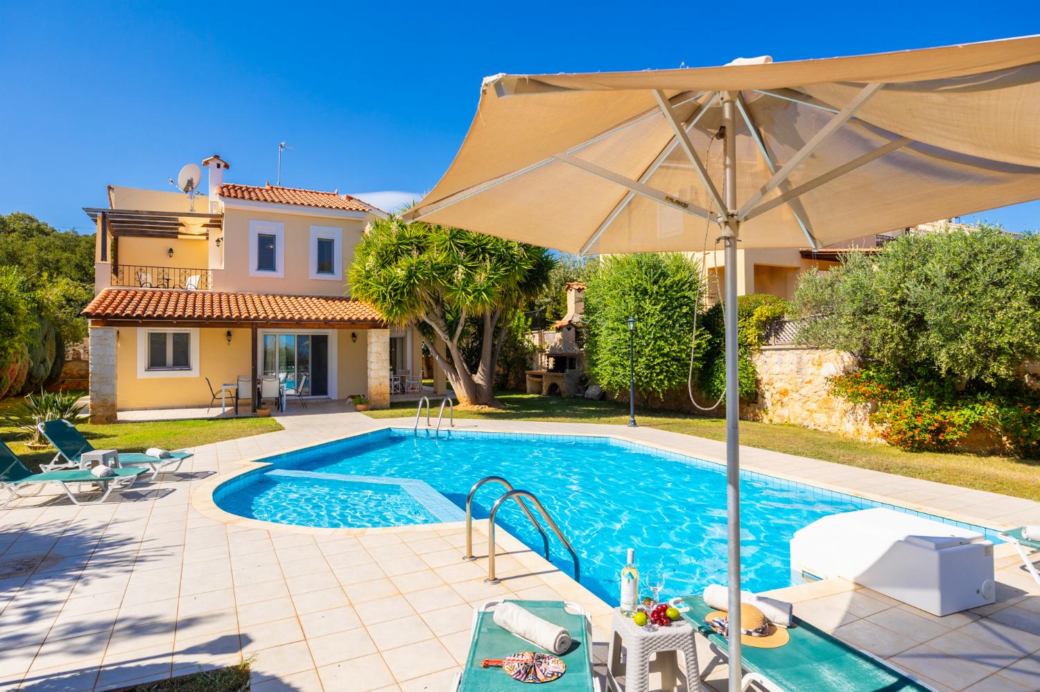 ,Beautiful villa with private pool, terrace, and garden