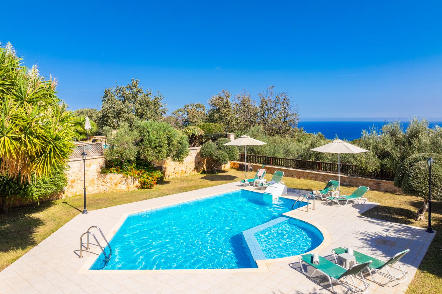 Private pool, terrace, and garden with sea views