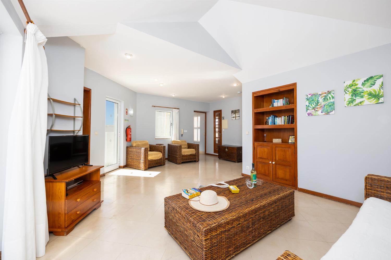 Living area with sofa and TV