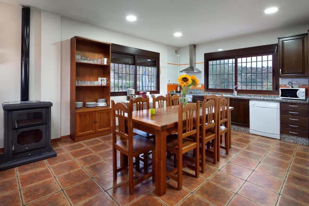 Open-plan living room with sofas, dining area