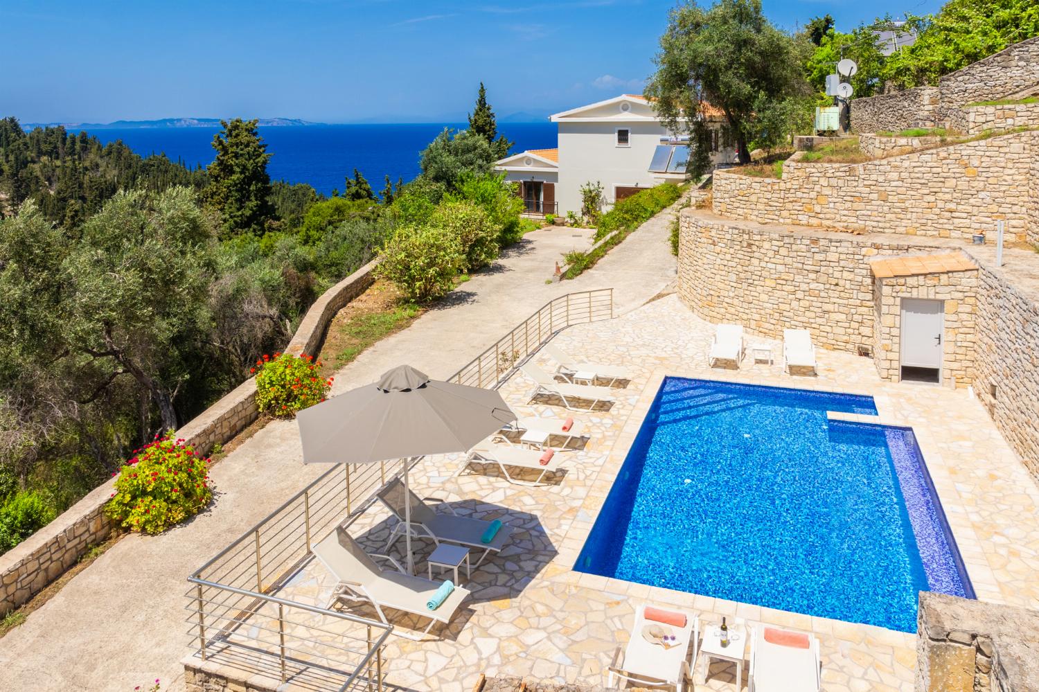 ,Beautiful villa with private pool, terraces, and garden with panoramic sea views