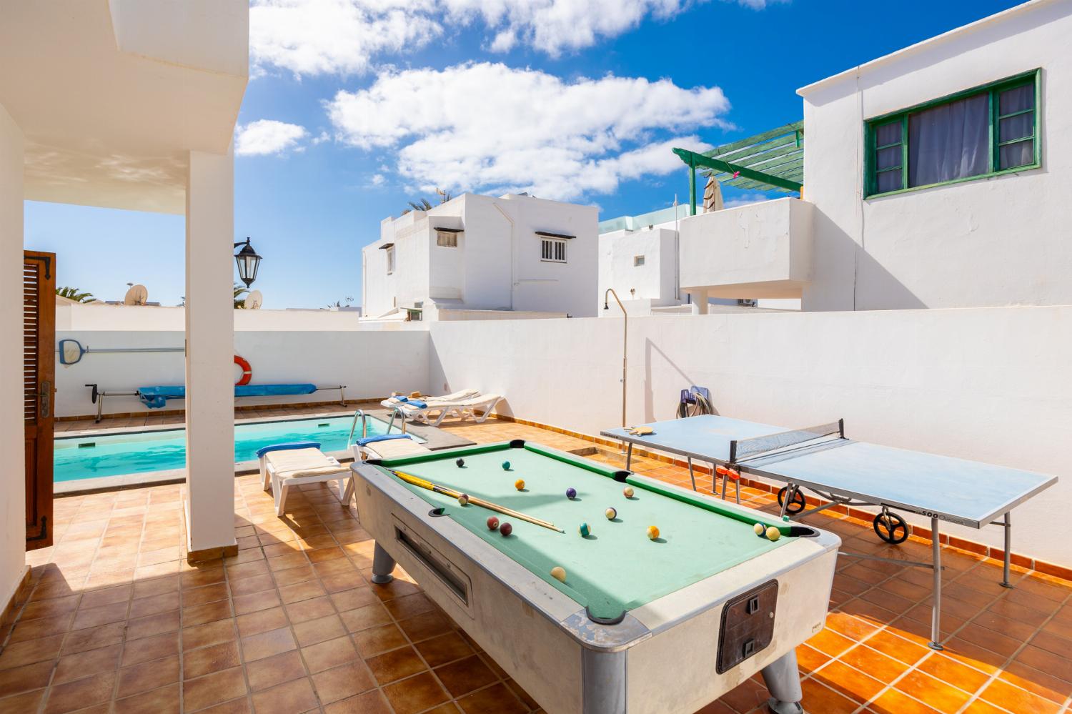 Terrace area with pool table and table tennis
