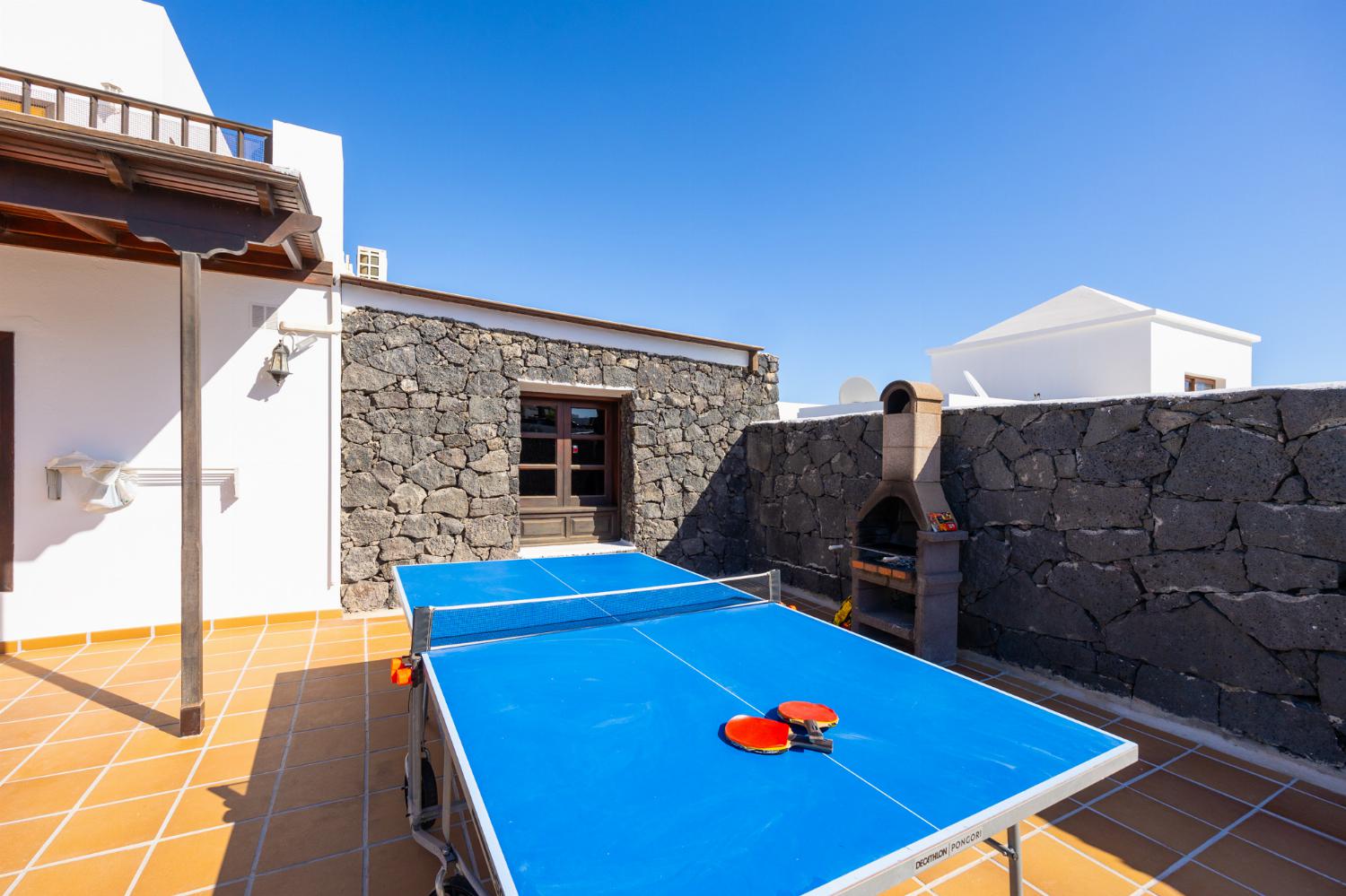 Terrace area with table tennis and BBQ