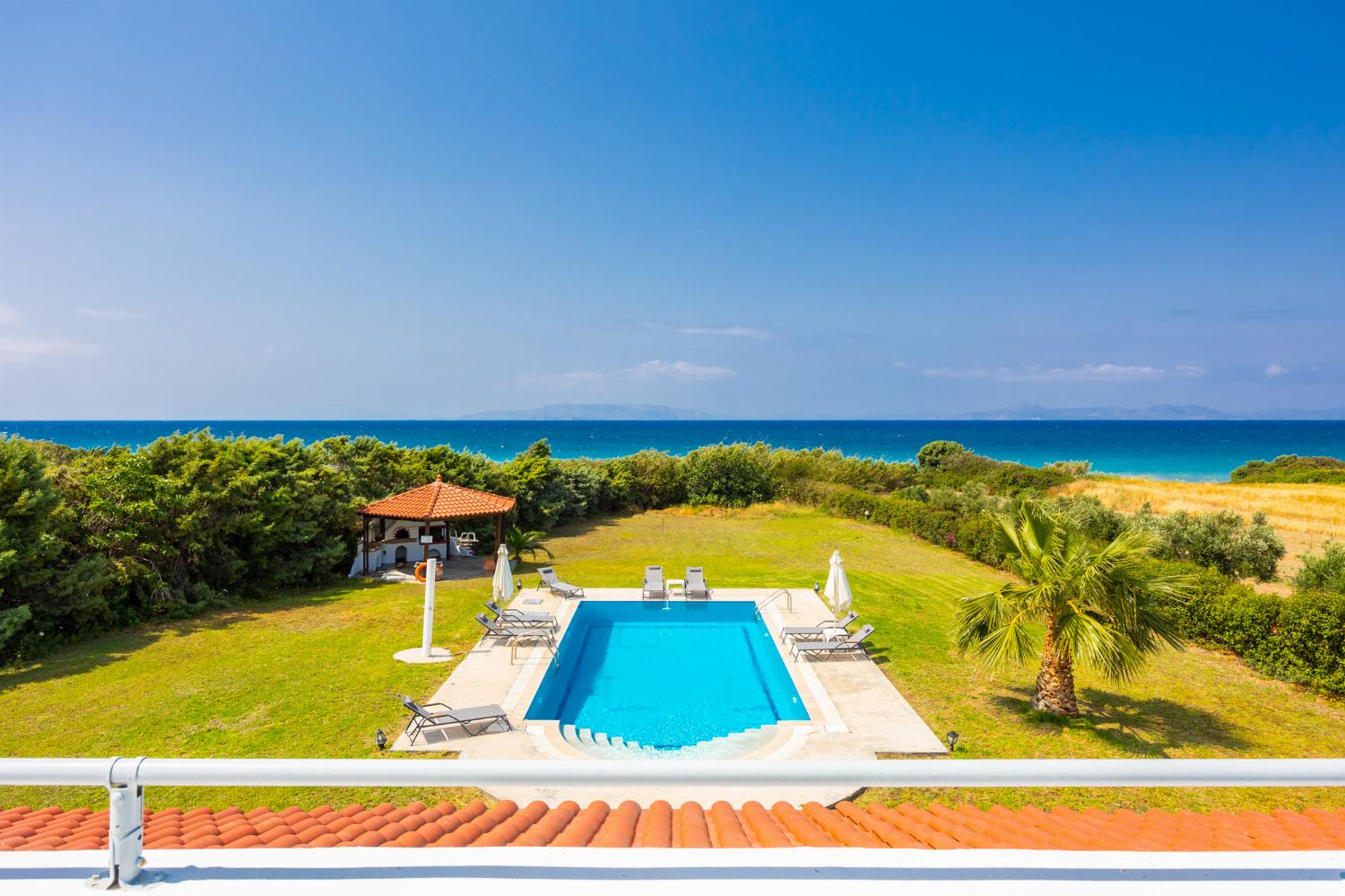 Private pool, terrace, and garden with sea views
