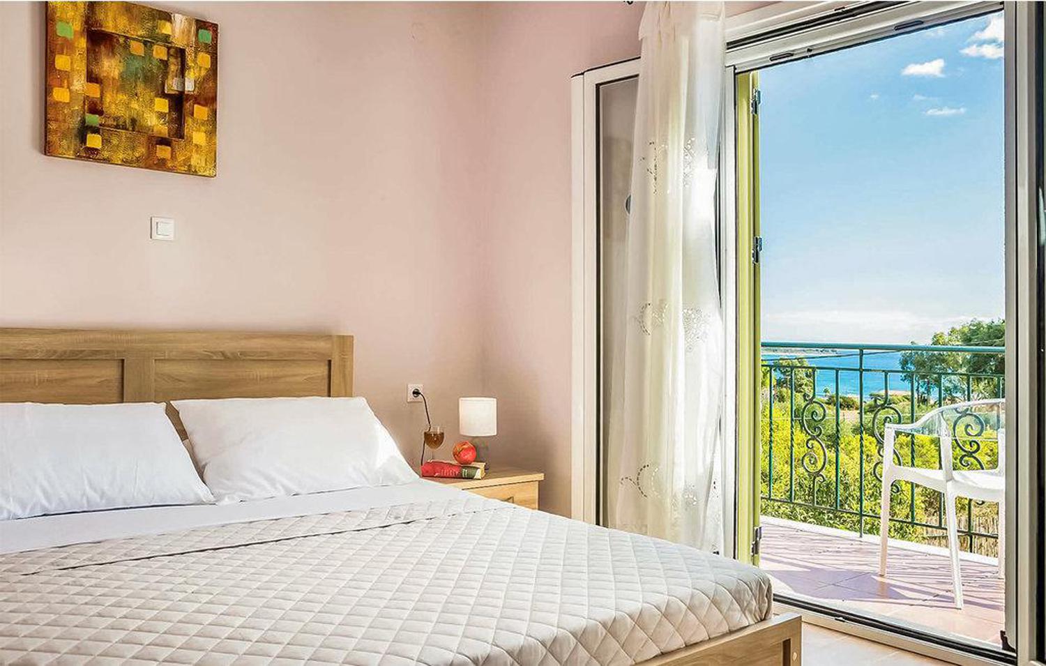 Double bedroom with terrace access with panoramic sea views