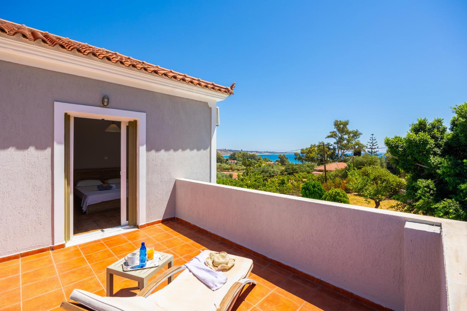 Upper terrace area with sea views