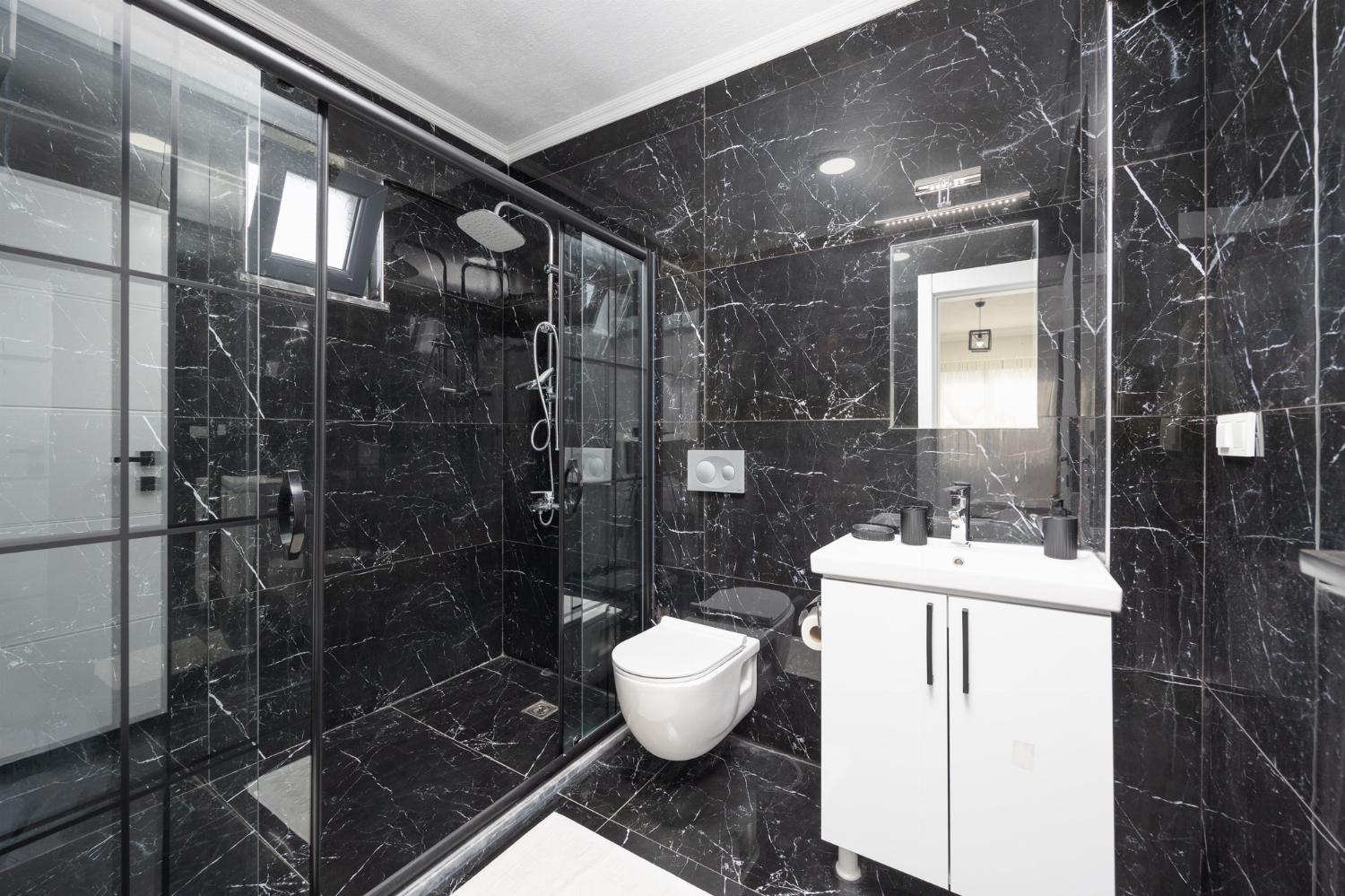 En suite bathroom with shower