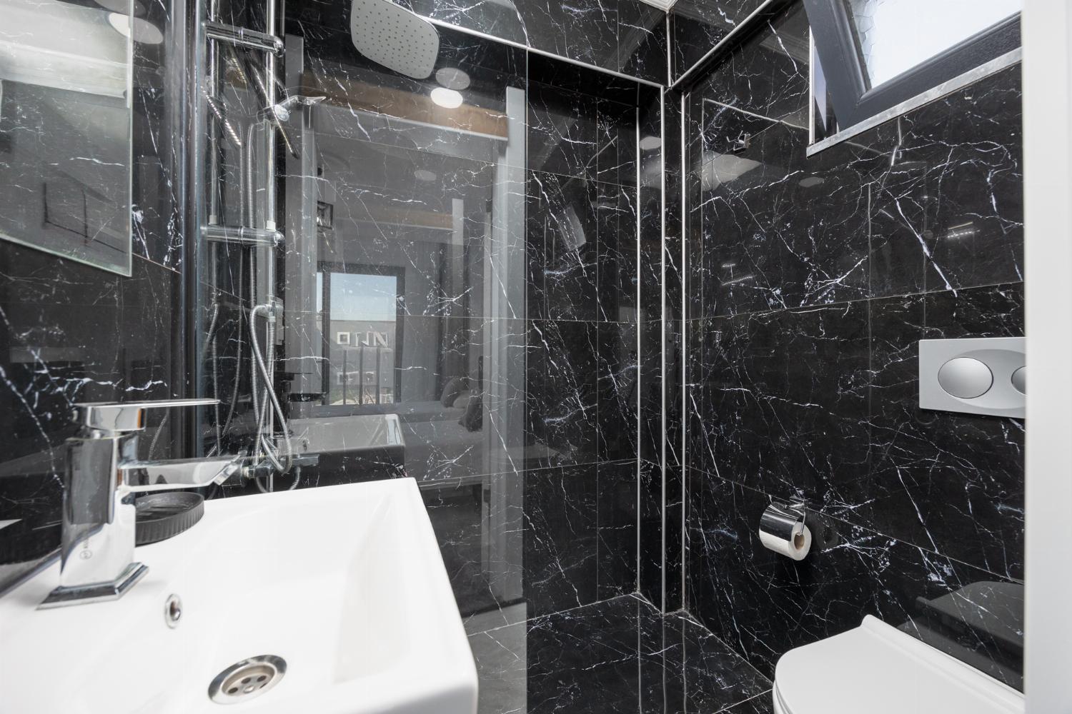 En suite bathroom with shower